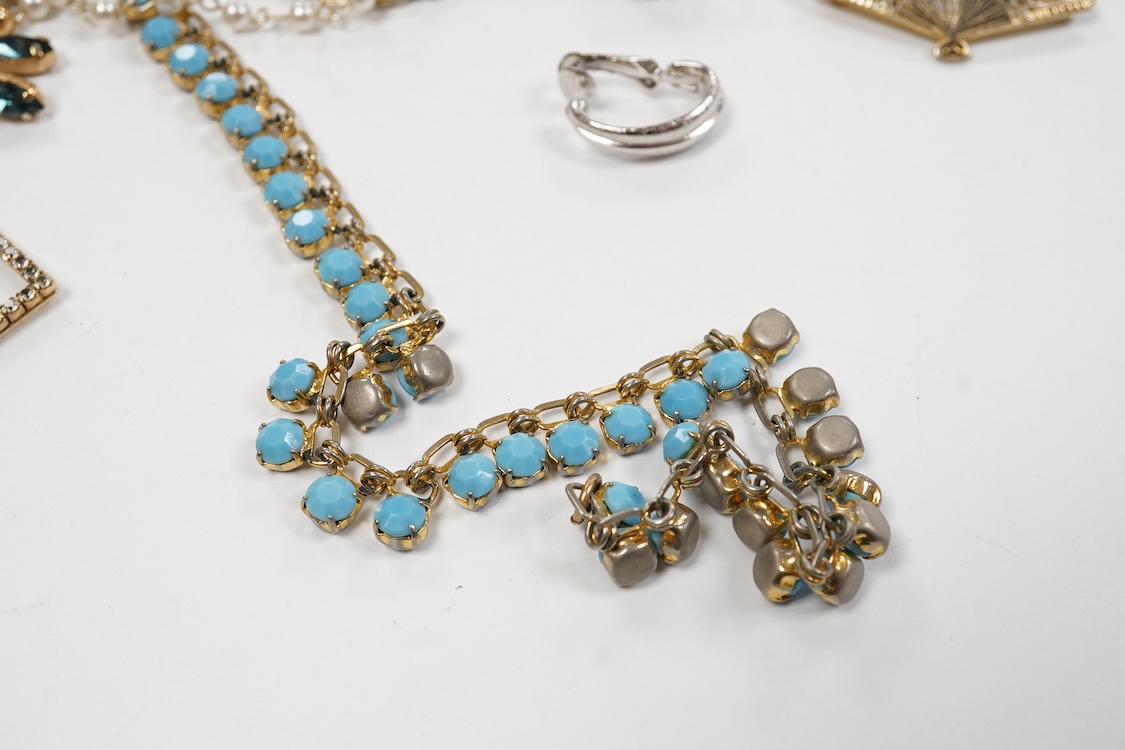 A 9ct and cabochon black onyx set pendant, on a 9ct chain, a 9ct and gem set ring and pair of 9ct and cultured pearl set ear clips, together with other items including costume jewellery, a silver bangle and a silver book